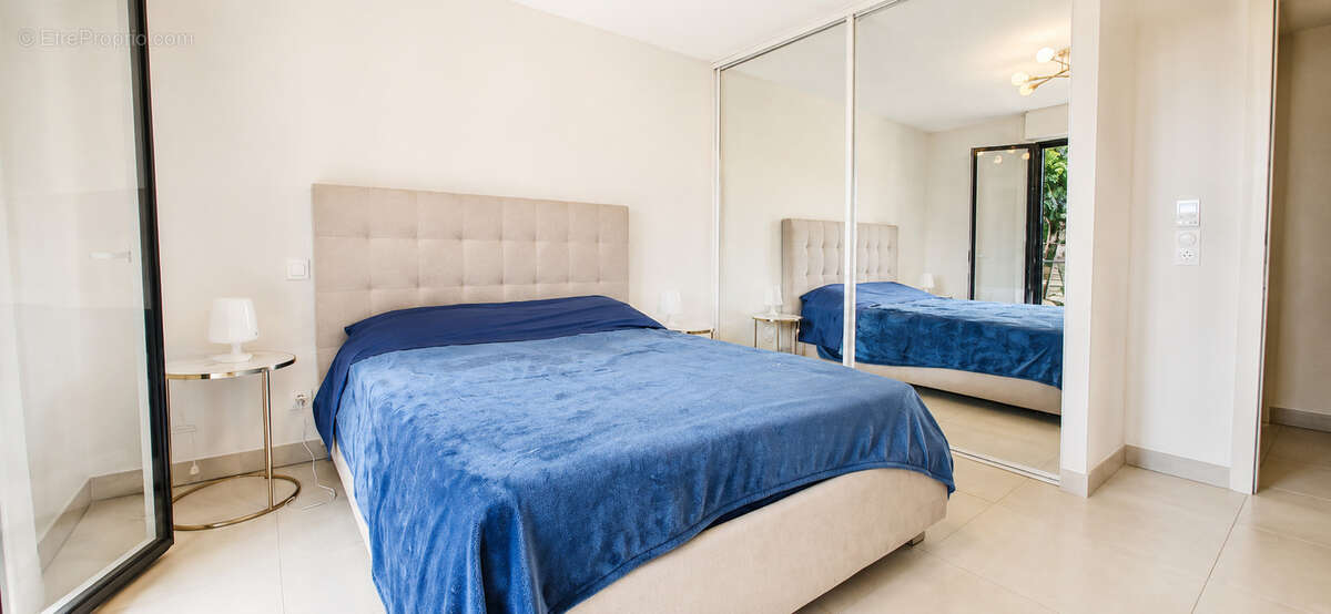 EXCLUSIVITE - Grand 2 pièces en rez de jardin + garage - photo 5