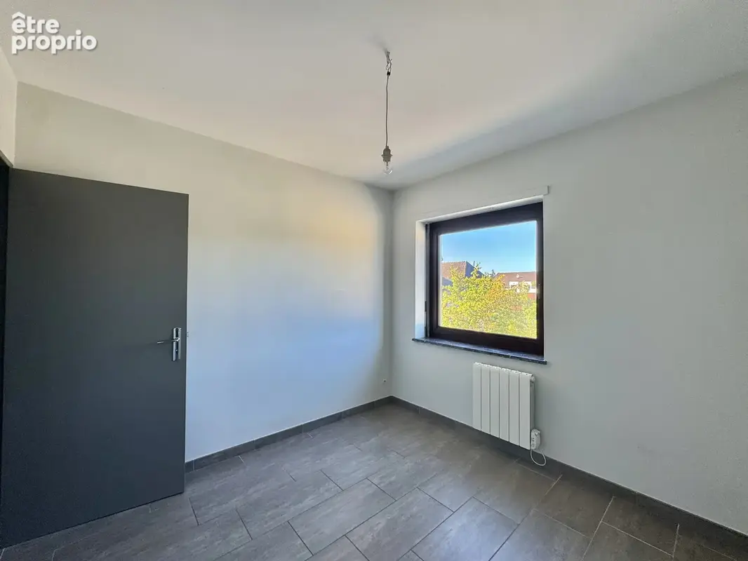 ZILLISHEIM - Centre ville, 4 pièces avec balcons, parking et cave - photo 12