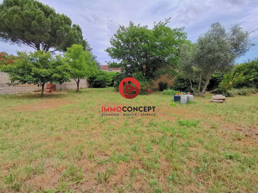 Maison à LAUDUN-L&#039;ARDOISE