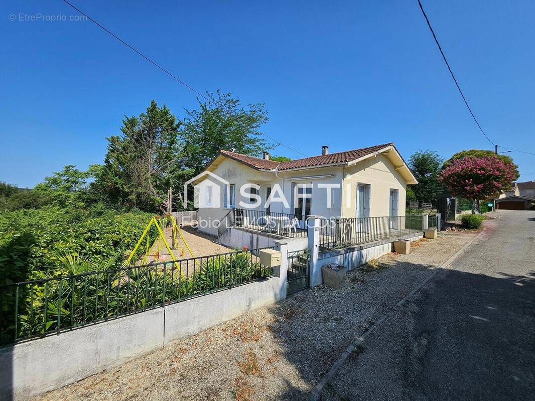 Photo 1 - Maison à COURRENSAN