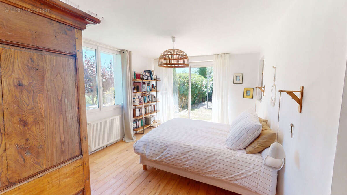 Maison 8 pièces de 200m² - photo 11