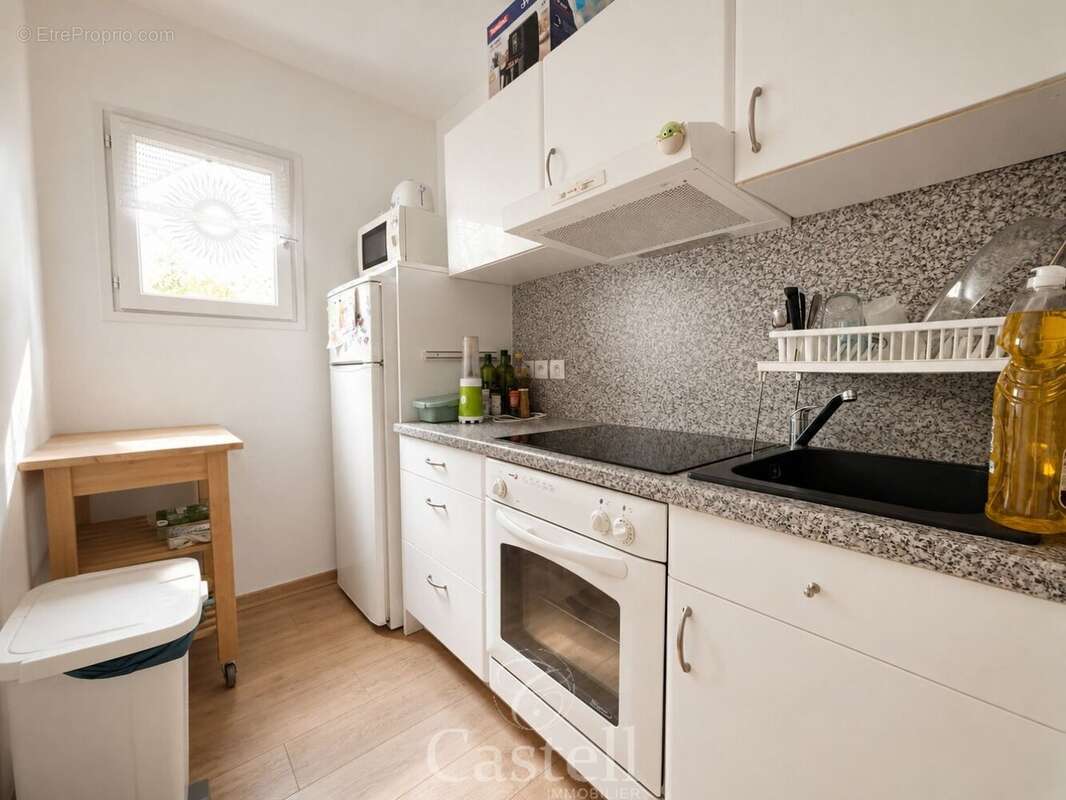 *** grand deux pieces + parking, cave et terrasse *** - photo 4