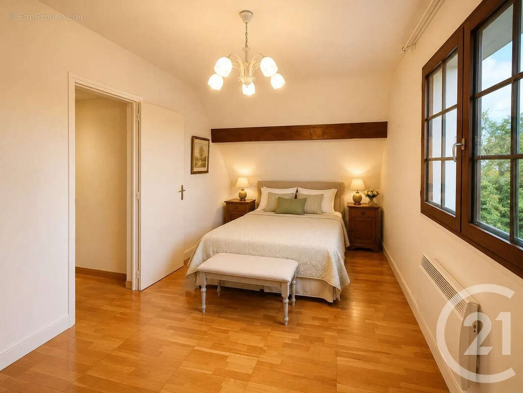 Maison 109 m² à La Chapelle-Reanville  - photo 6