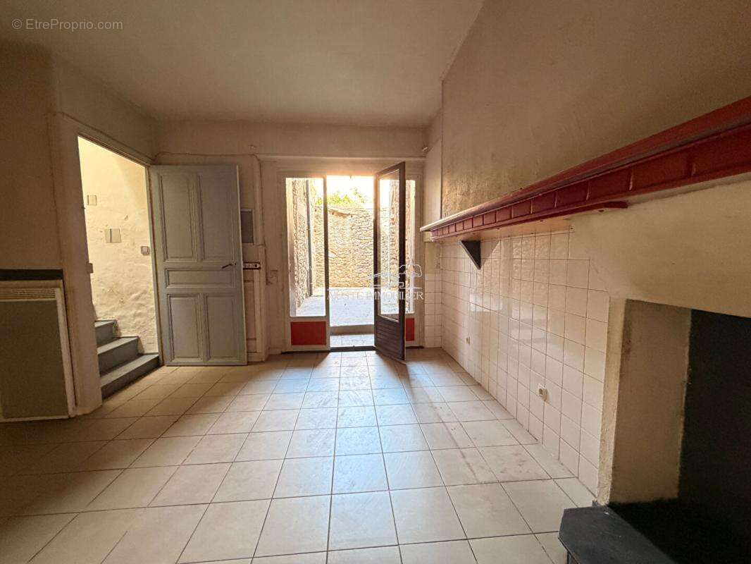 Maison avec patio coeur de village Siran - photo 2