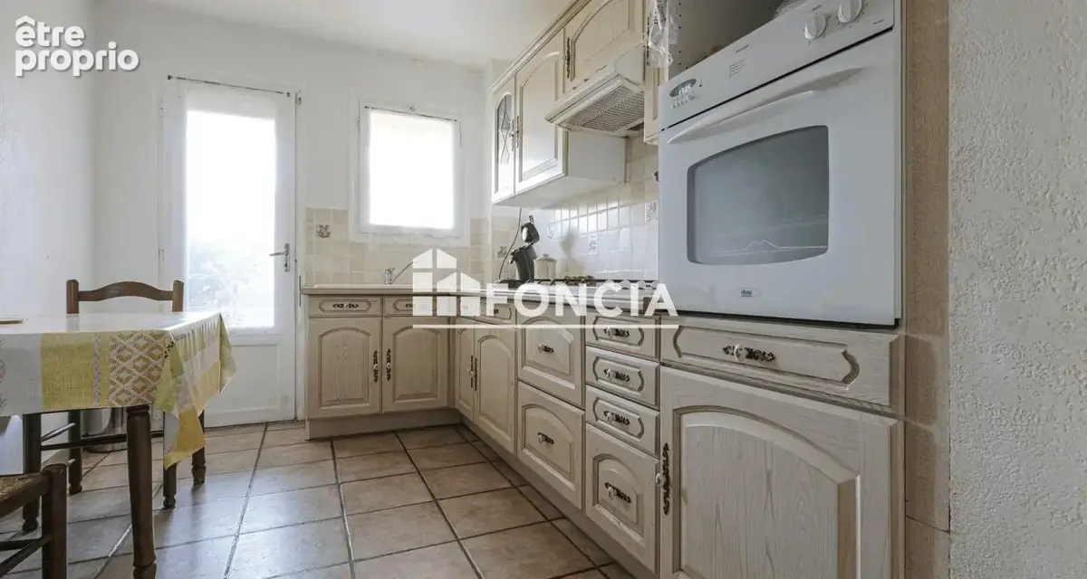 Appartement avec locataire en place-  5 pièces de 100 m² avec balcon, cave et parking - photo 3
