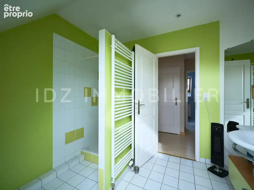 Maison 6 pièces 143 m² à vendre à Bartenheim (68870) - photo 9