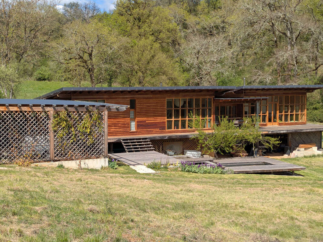 Maison en bois bioclimatique sur grand terrain - photo 2
