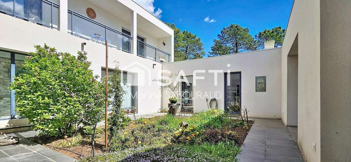 Photo 2 - Maison à REGUSSE