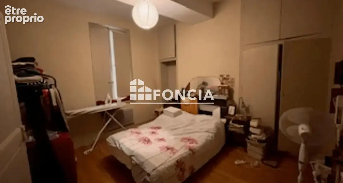 Situé en plein cœur de ville, cet immeuble de caractère se compose de 7 appartements actuellement loués.  L’ensemble développe u - photo 6