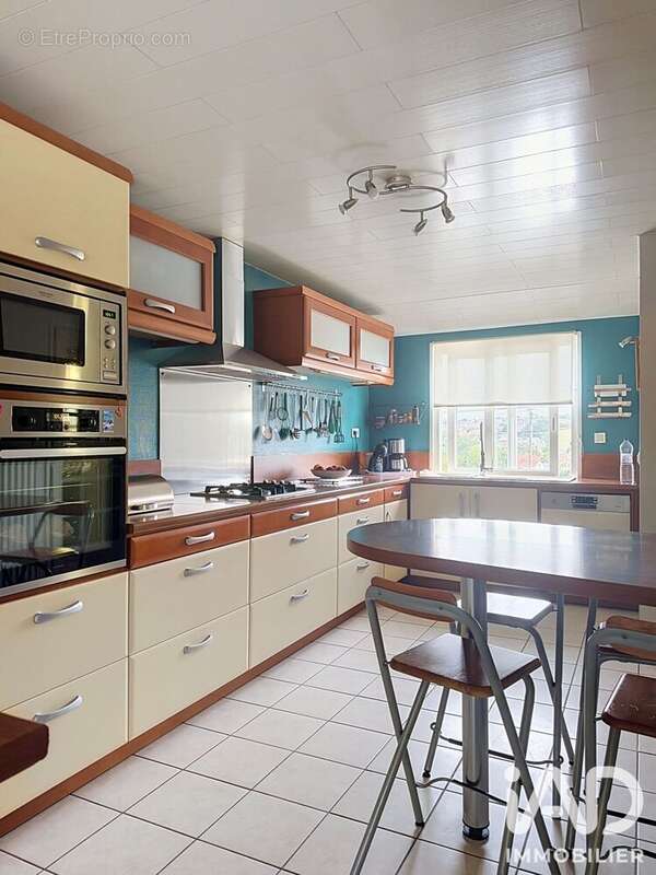 Maison 100 m² à Saint-Etienne-Au-Mont  - photo 3