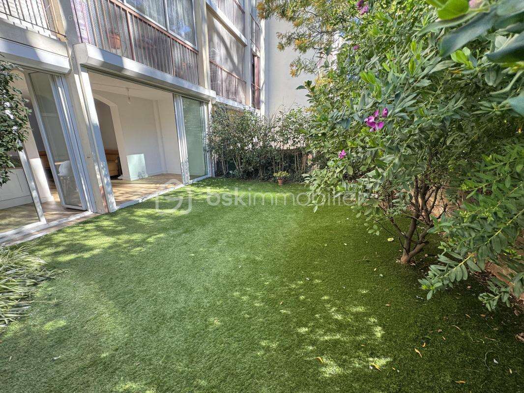 appartement rez de jardin de 105 M2 - photo 8
