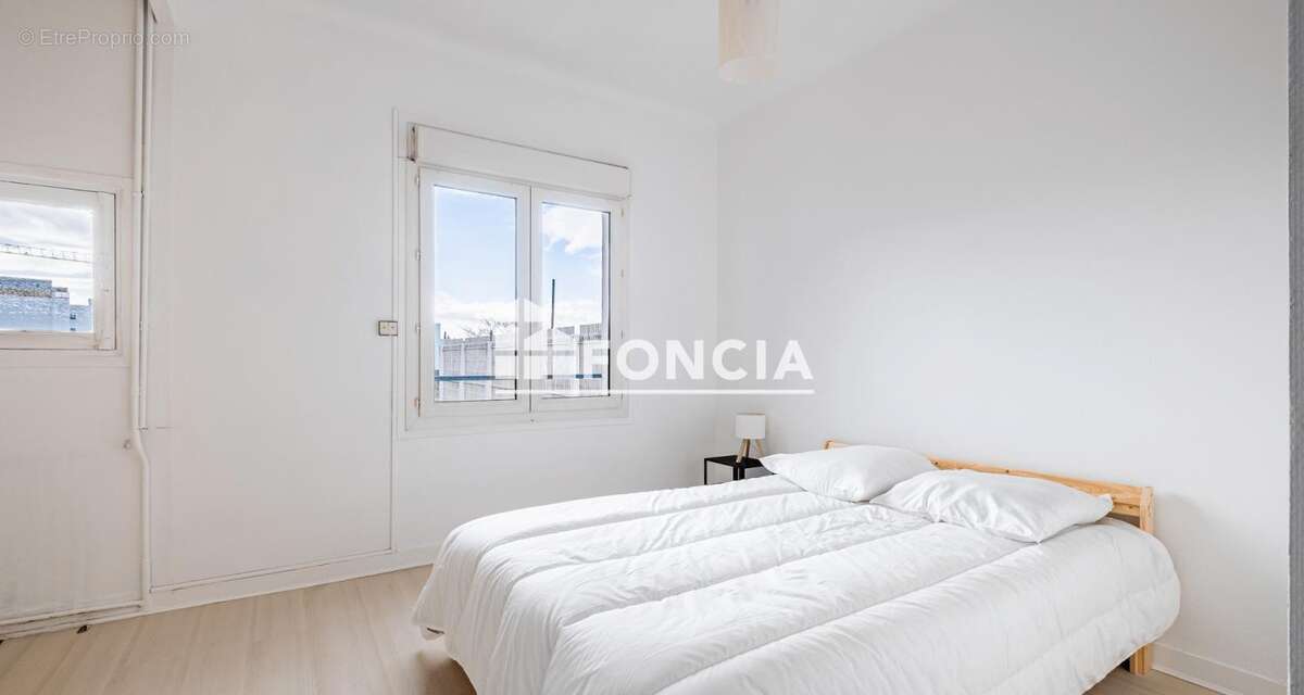 Centre ville - APPARTEMENT T3 avec balcon et caveau - photo 5