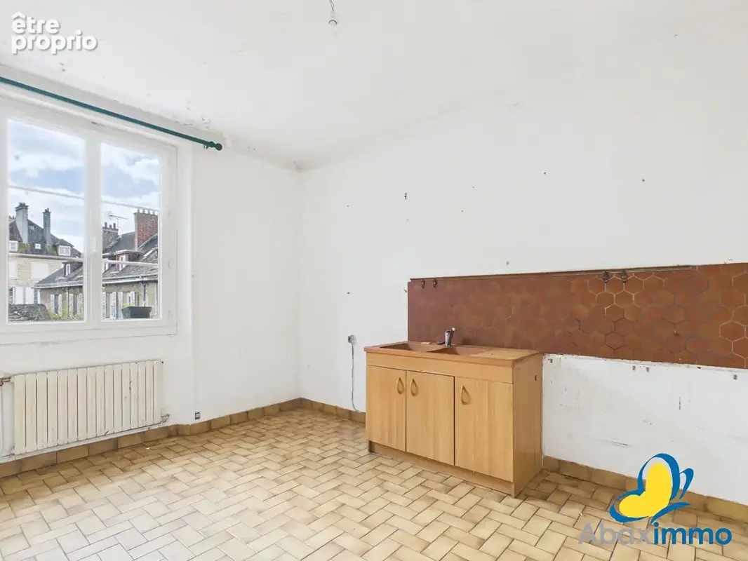 Appartement 2 pièces et cave (possiblité garage) - Centre-ville - photo 4