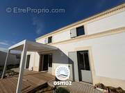 Maison à SAINT-LAURENT-DE-LA-PREE