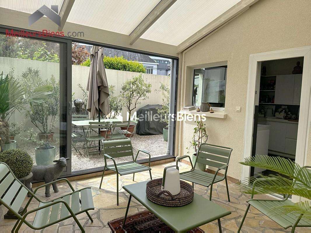 Élégante maison de caractère – 170 m² – Volumes et art de vivre - photo 4