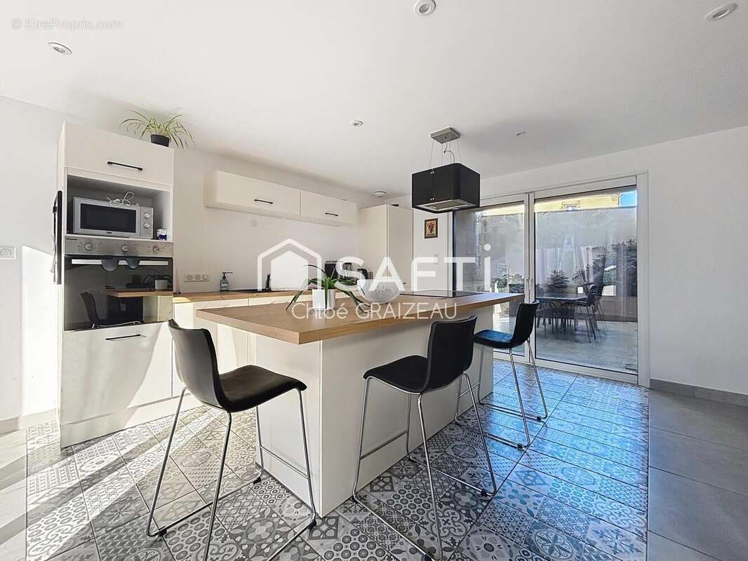 Photo 4 - Maison à LA CHAPELLE-SAINT-LAURENT