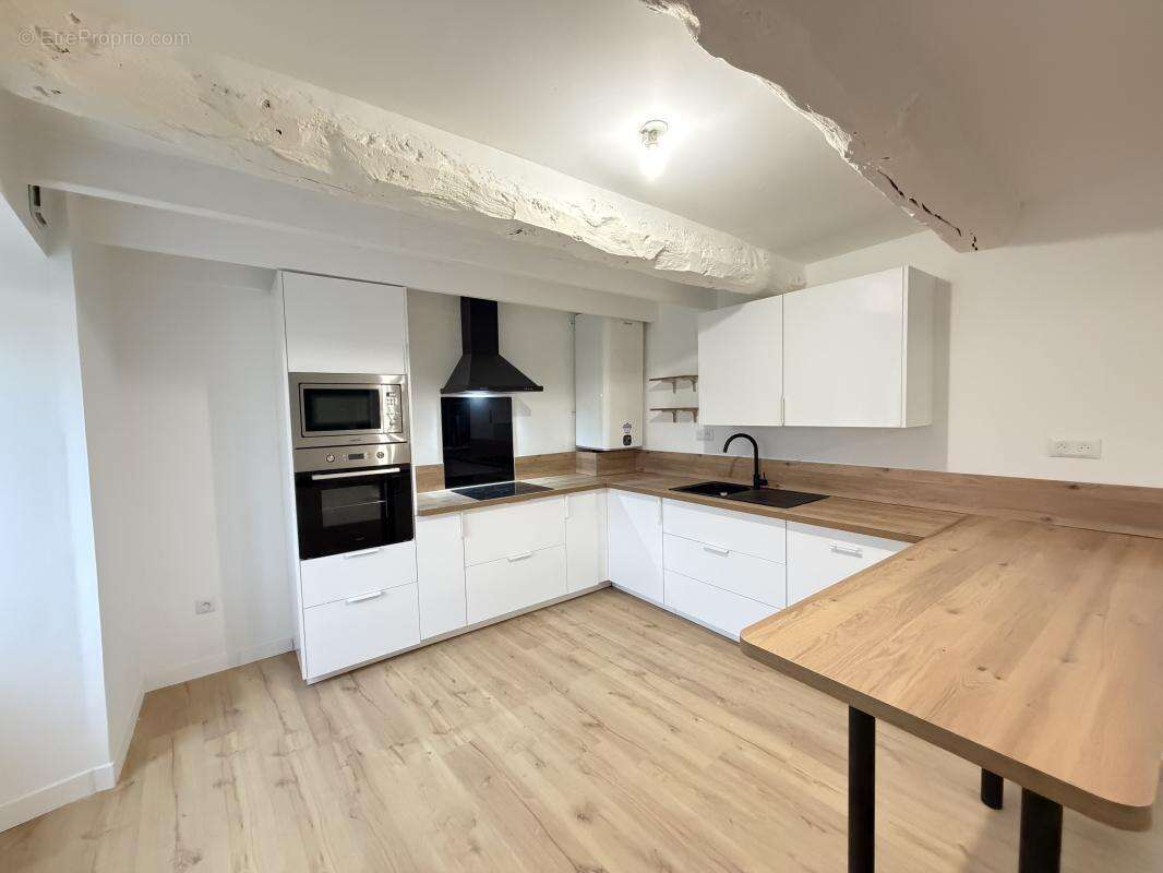 Maison 4 pièces 105 m2 - photo 2