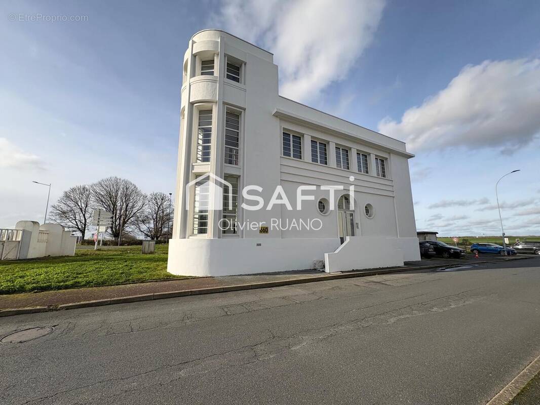 Photo 1 - Commerce à DEOLS