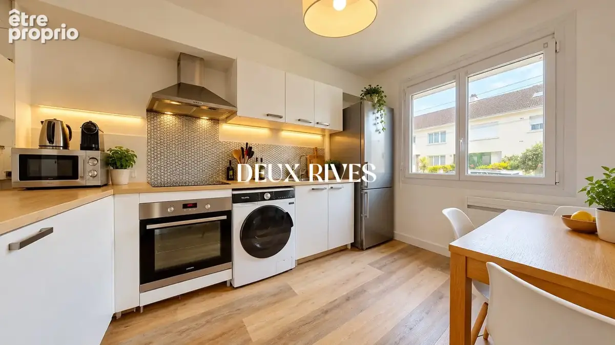 Appartement 4 pièces 74 m² à vendre à Nantes (44300) - photo 2
