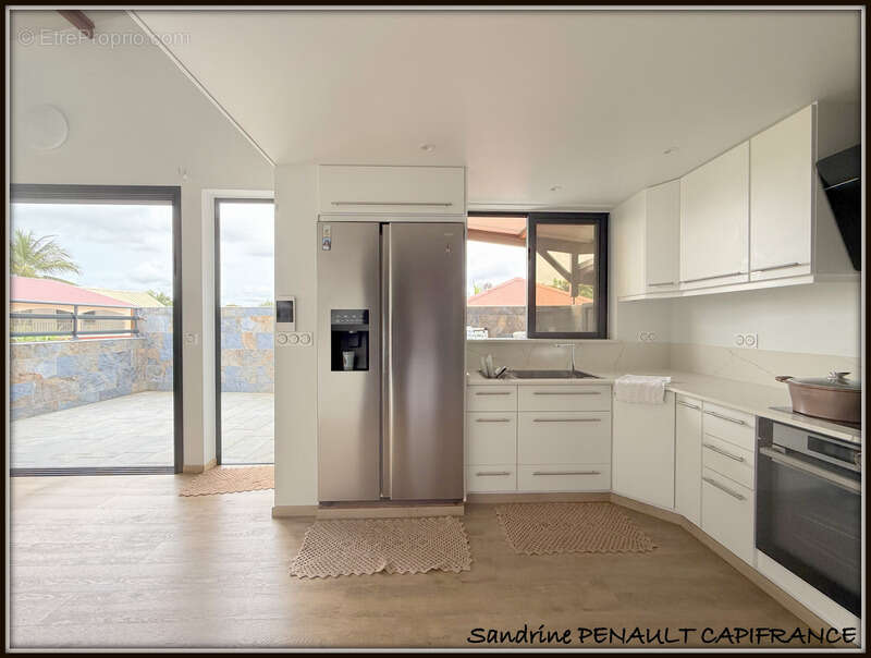 A vendre a kourou (97310) une magnifique villa t7 de 246 m² - avec 2 appartements t2 - terrain de 345 m² - au prix de 599 000 € - photo 14