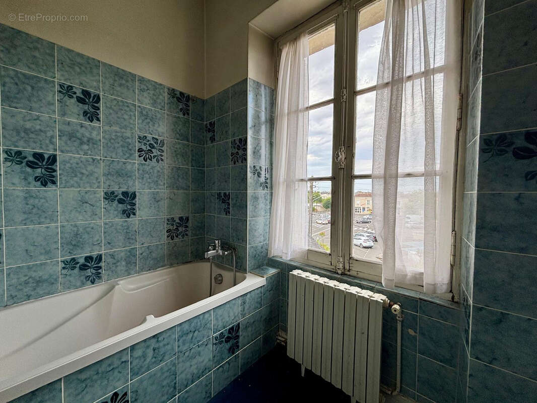 Charmante maison en pierre de 139 m2 avec préau, garage et cave - photo 9