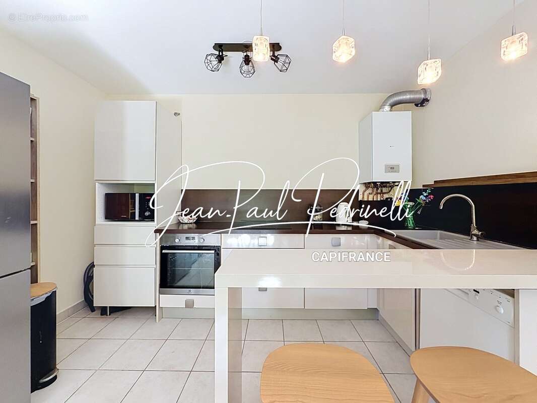 Tassin-la-Demi-Lune - Appartement 2 pièces de 48 m² avec balcon, parking privatif et cave - résidence sécurisée récente - photo 23