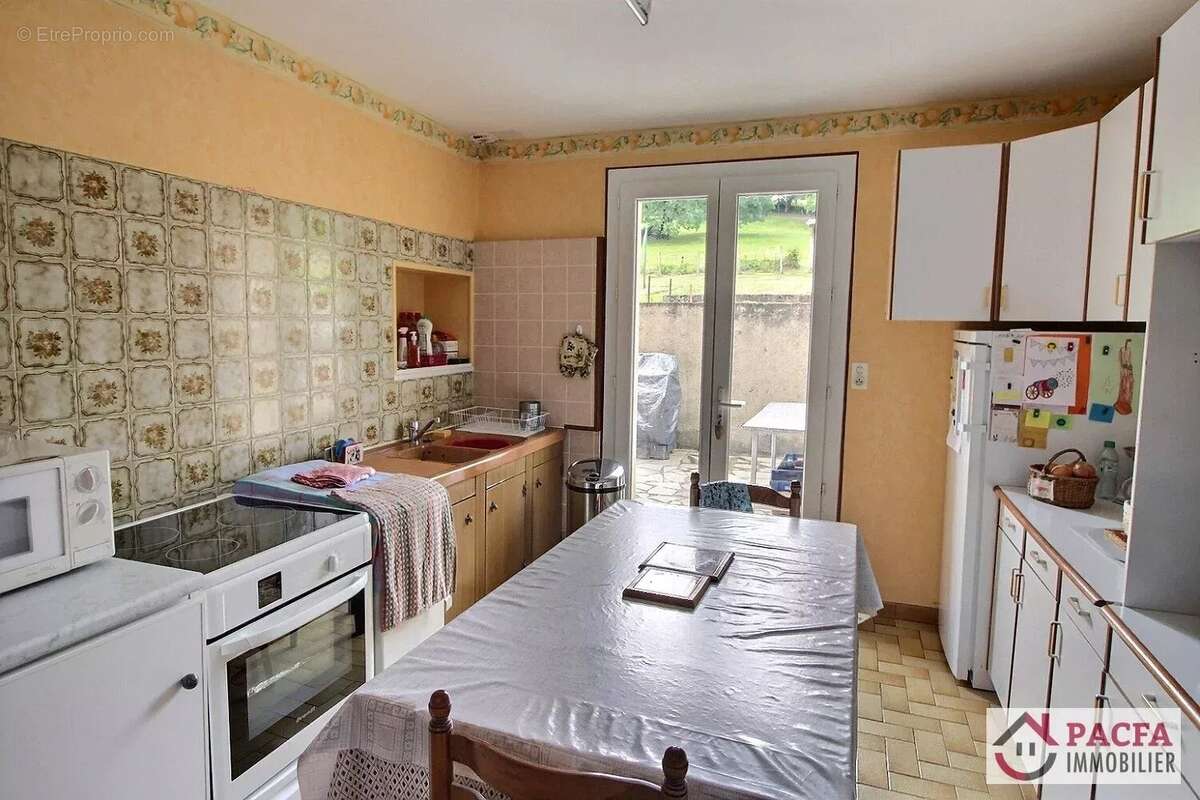 Maison de 95 m² avec jardin et garage - photo 3