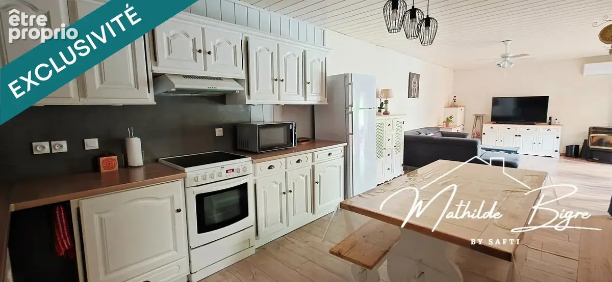 Photo 1 - Maison à LE BREUIL-SUR-COUZE