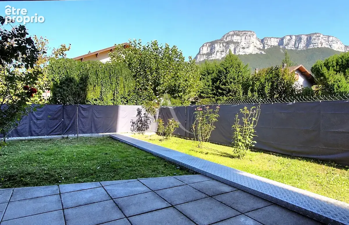 Rez-de-jardin Barby 3 pièce(s) 62.17 m2 avec place de parking - photo 1