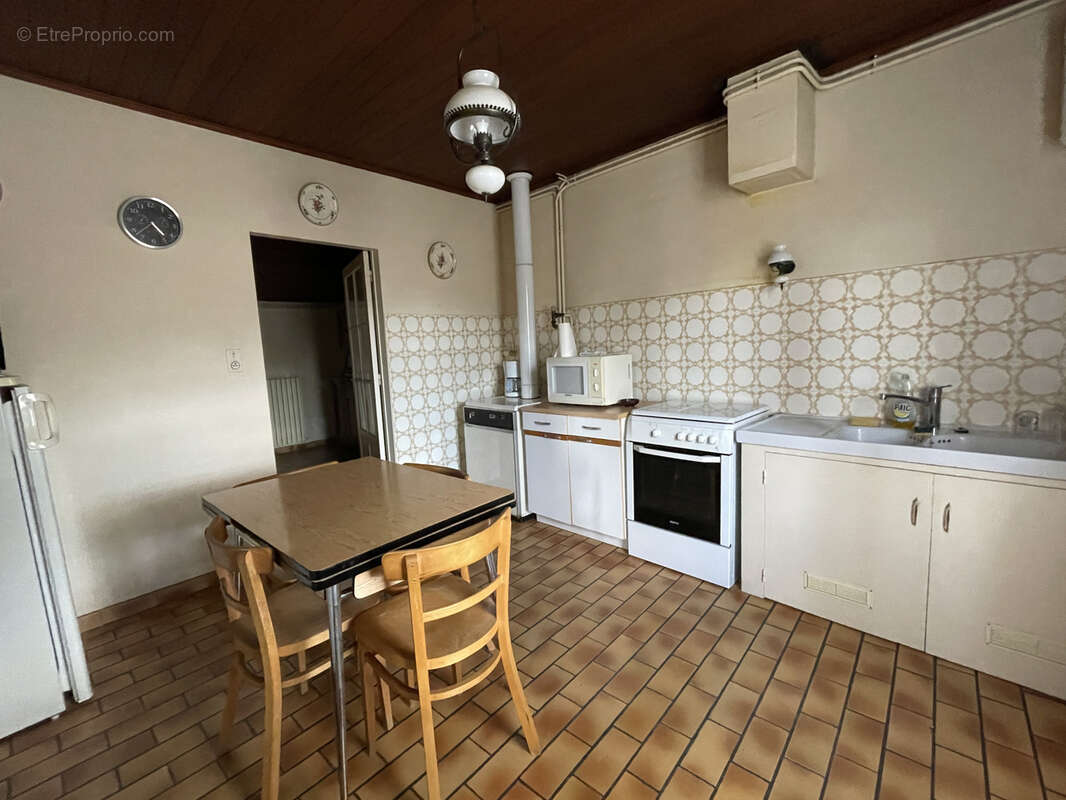 Maison de plain-pied avec terrain de 1 400 m2 et parcelle constructible - photo 3