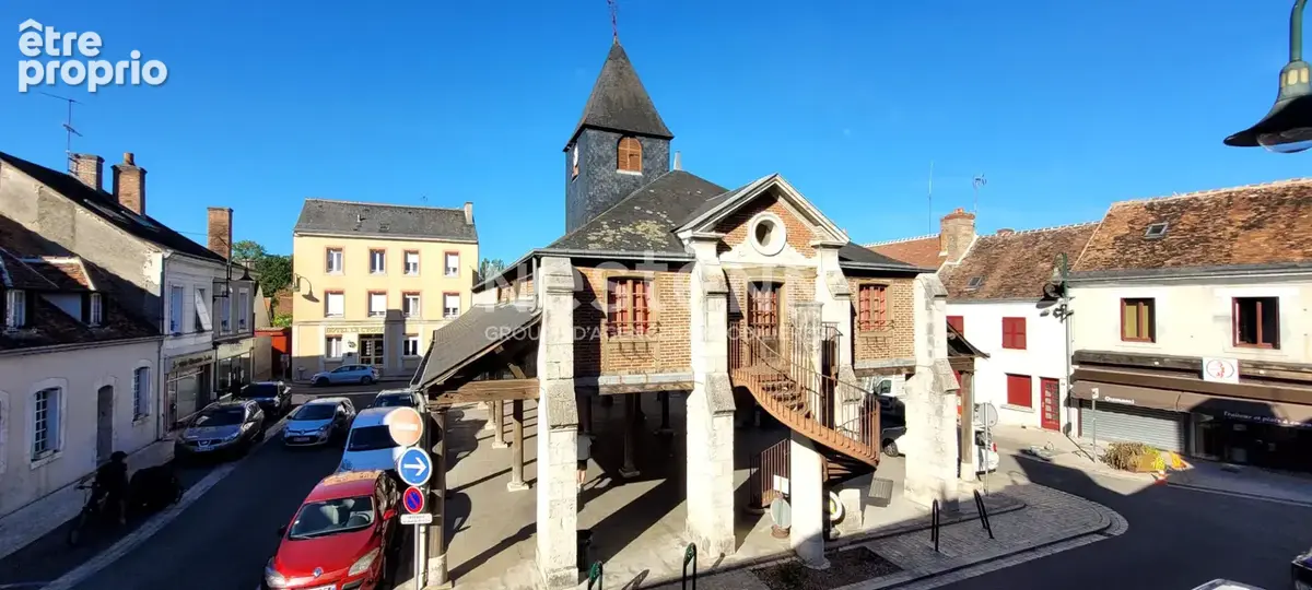 Immeuble mixte : boulangerie louée + appartement : 251 m² utiles + annexes - photo 2
