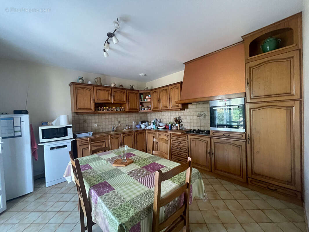 Maison 3 chambres avec véranda, garage et terrain de 578 m²  - Environnement calme - photo 7
