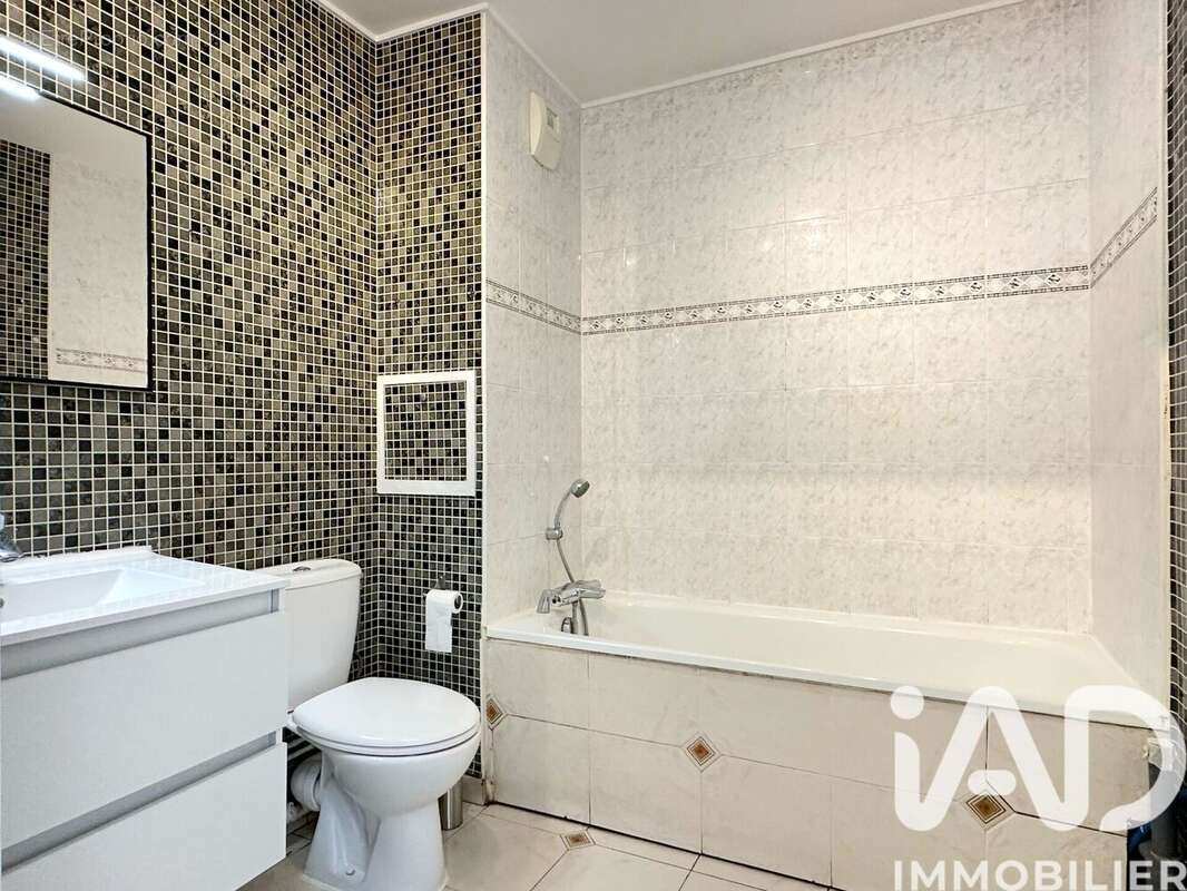 Photo 7 - Appartement à LA COURNEUVE