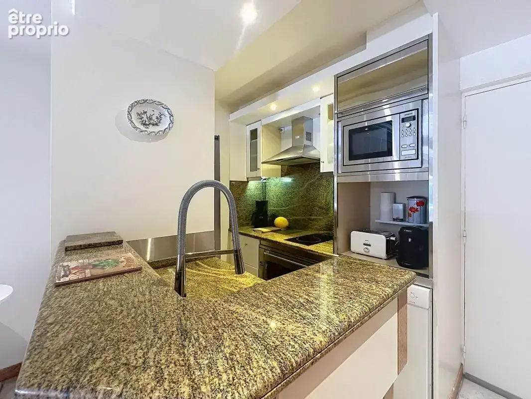 2/3 pièces en rez-de-jardin avec garage et cave dans une résidence de standing avec piscine - photo 5