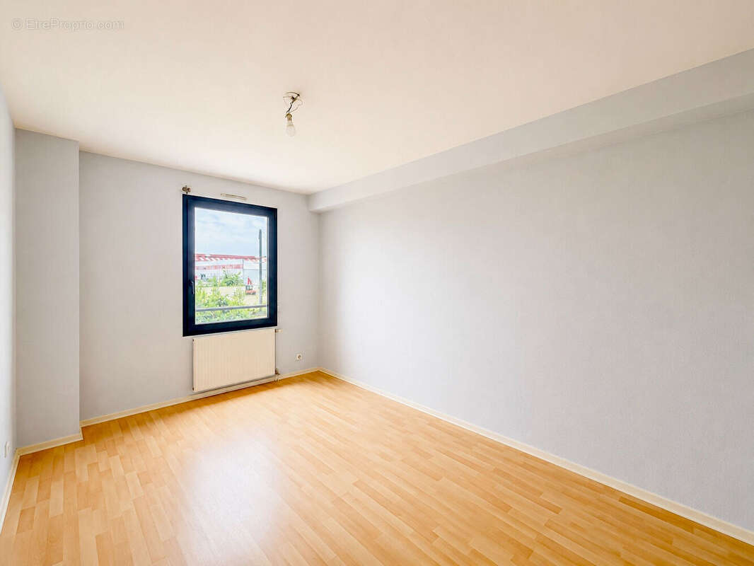 Appartement T4 de 99 m² avec terrasse et loggia - photo 7