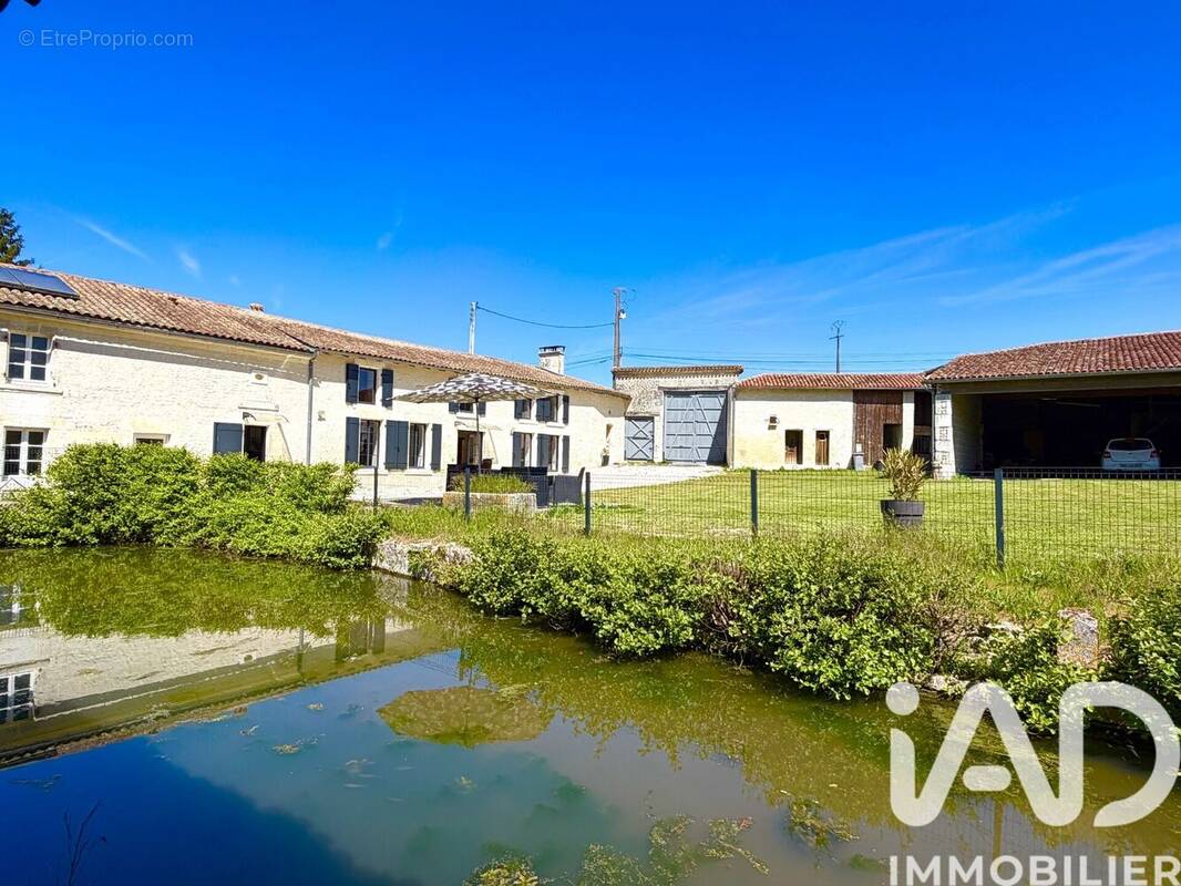 Photo 1 - Maison à CHALLIGNAC