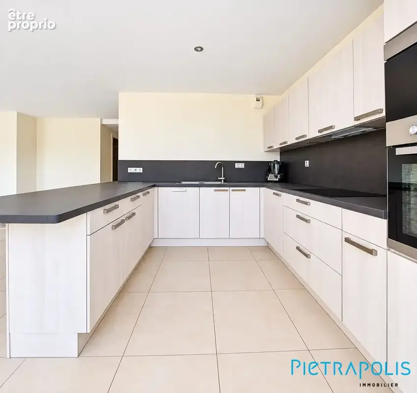 Appartement 4 pièces 110 m² à vendre à Saint-Genis-Pouilly (01630) - photo 8