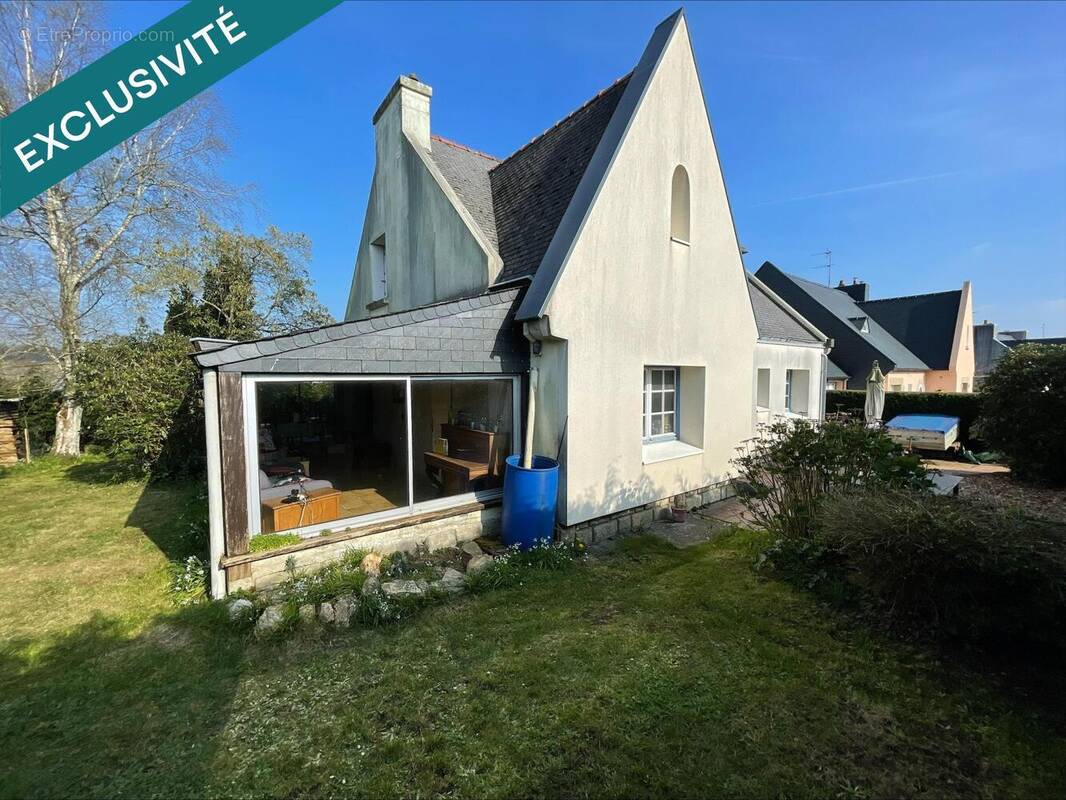 Photo 1 - Maison à PLUGUFFAN