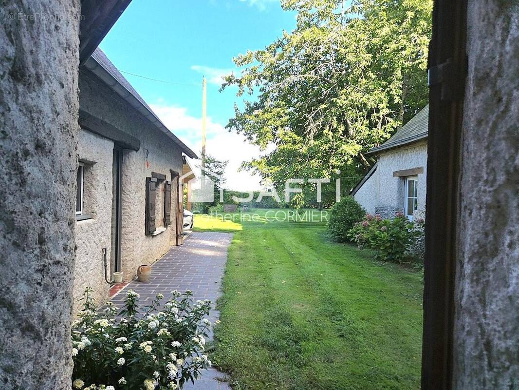 Photo 1 - Maison à LE PLESSIS-GRAMMOIRE