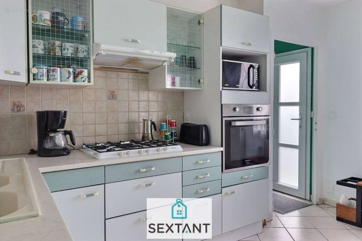 Maison mitoyenne 63m² 63300 Thiers - photo 2