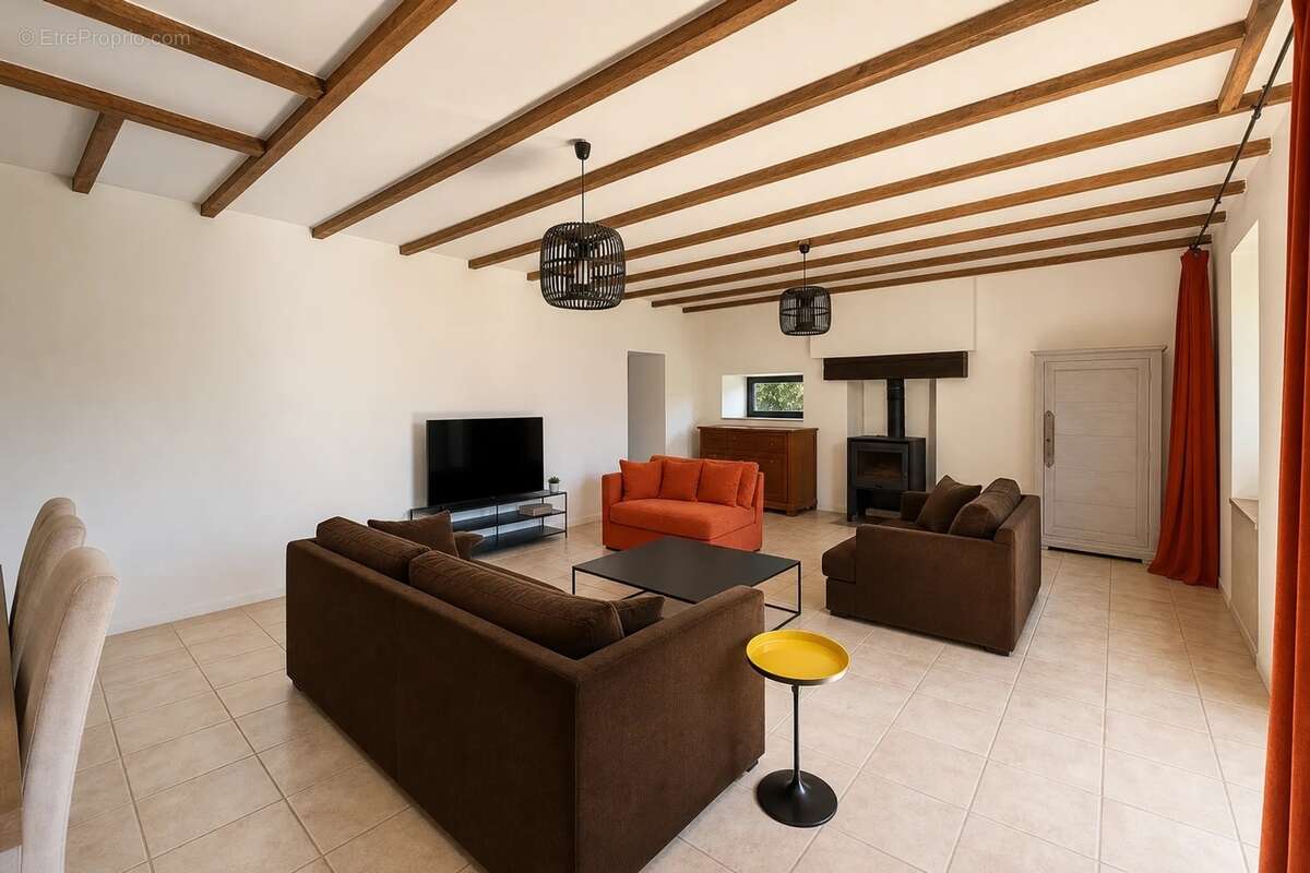 Maison familiale en pierres de caractère – 205 m² – 4 chambres – Jardin de 1 000 m² – Bréhan - photo 7