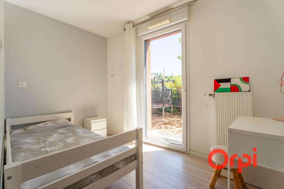 Appartement en rez-de-jardin avec un garage - photo 10