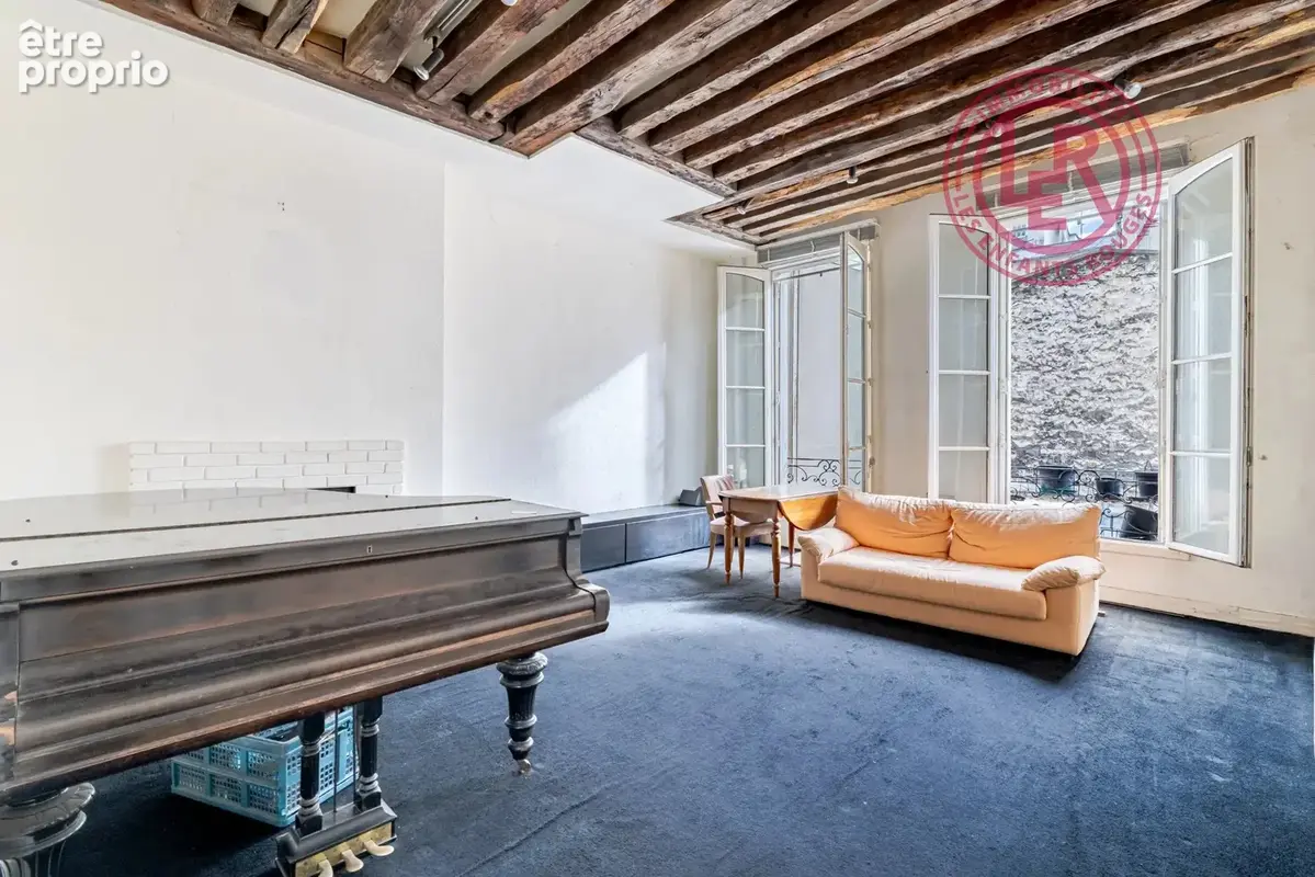 Paris 3ème - 2 Pièces de charme - 3,4m de hauteur sous plafond - photo 1