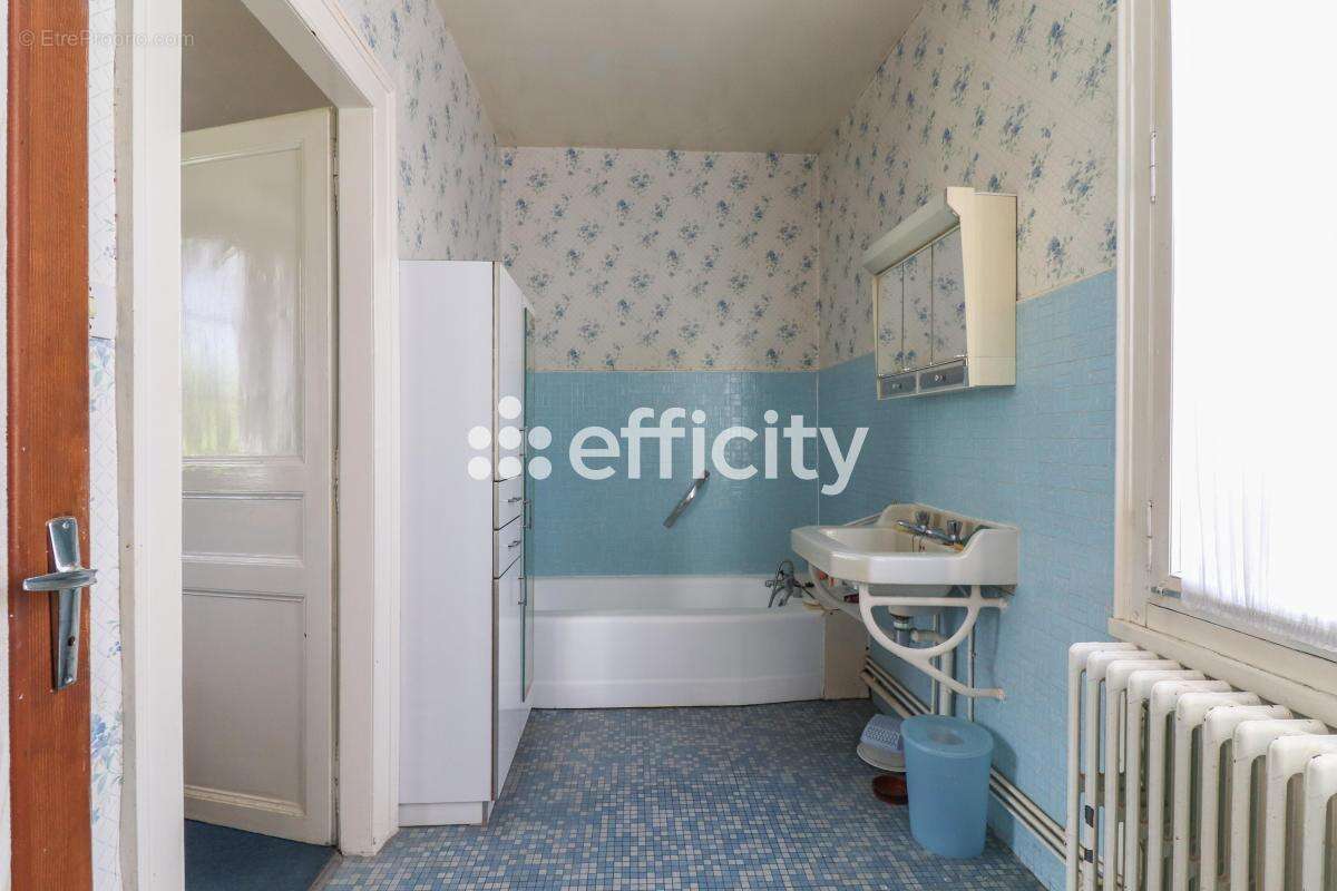 Maison 115 m² à Saint-Didier-Des-Bois  - photo 12