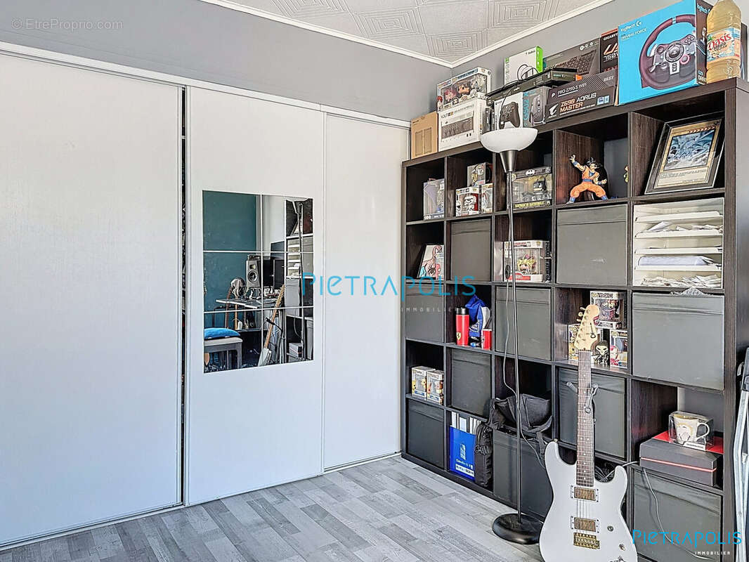chambre 2 - Appartement à VILLEFRANCHE-SUR-SAONE