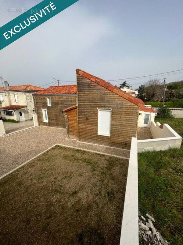 Photo 1 - Maison à L'ISLE-D'ESPAGNAC