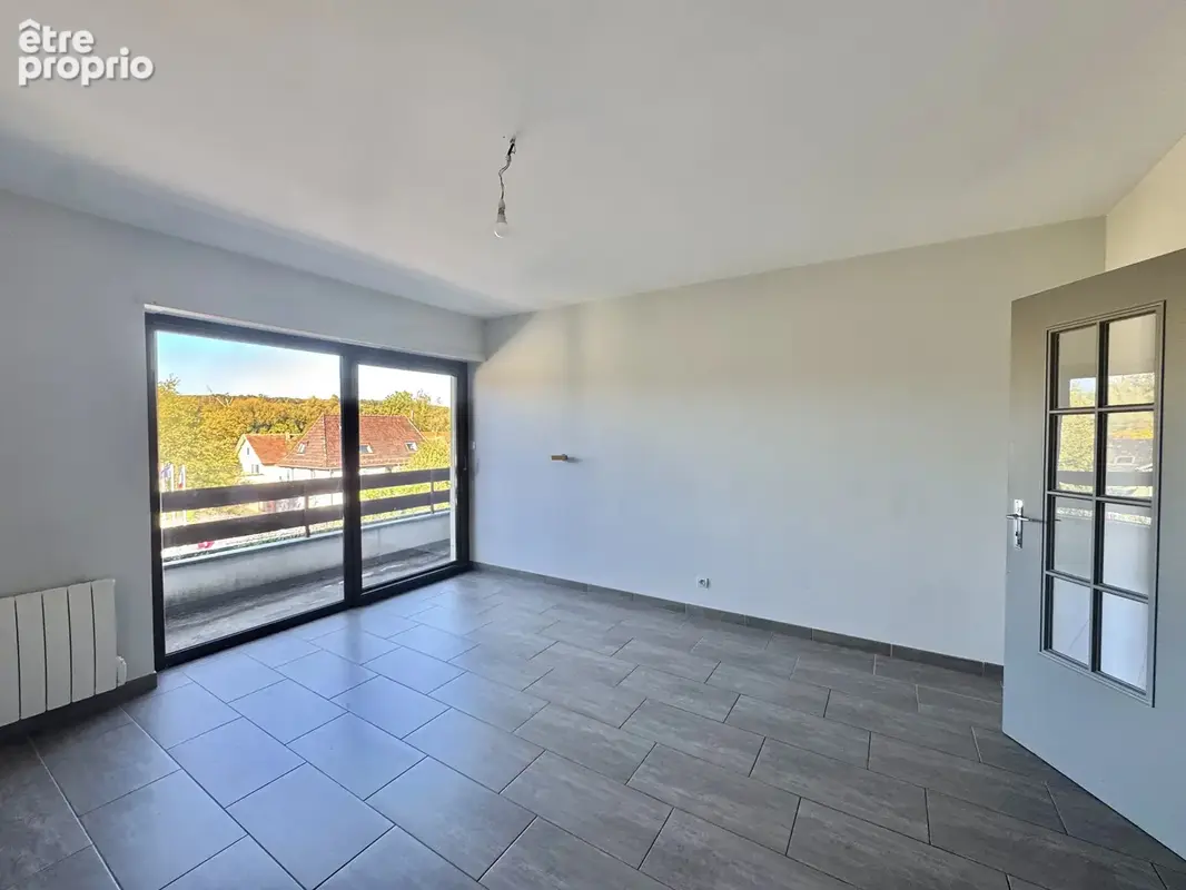 ZILLISHEIM - Centre ville, 4 pièces avec balcons, parking et cave - photo 3