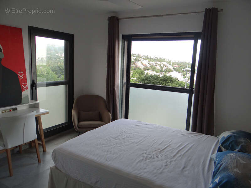 Appartement T3 d'exception de 80m2 vue océan SAINT GILLES LES BAINS (974) - photo 8