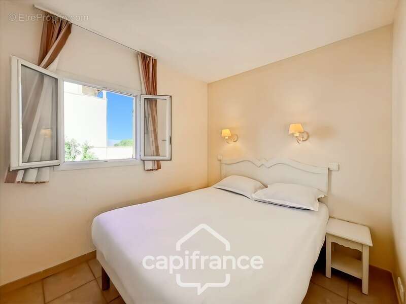 Investissement locatif appartement 3 pieces 42 m2 en angle   au 1er étage place de parking  sur le domaine de pont royal - photo 15
