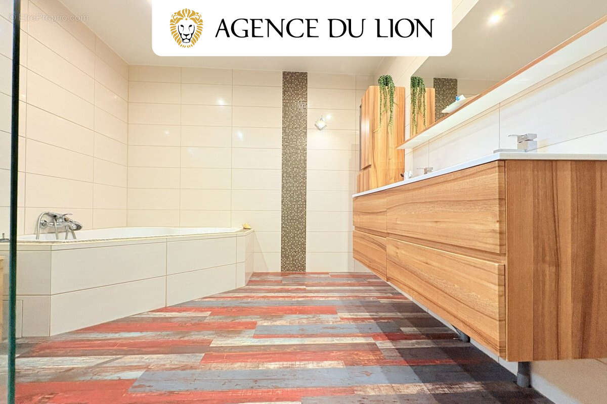 Maison traditionnelle de qualité – Géothermie – Terrain 2 900 m² - photo 10